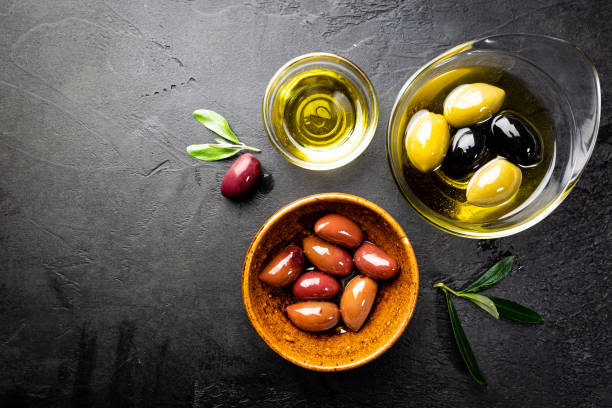 istock Black and green olives 1276446685