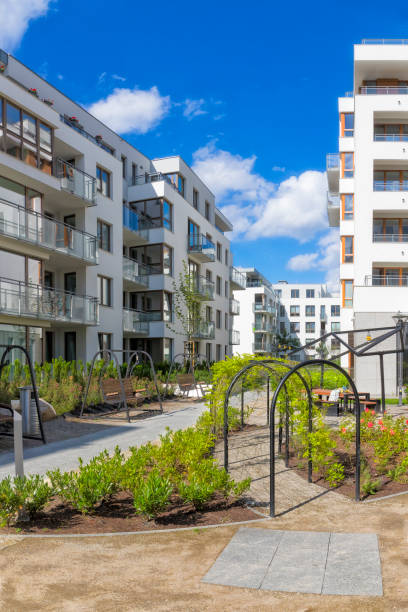 istock Modern benches on a square next to a housing estate 1276447917