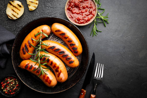 istock Fried delicious sausages 1276448137