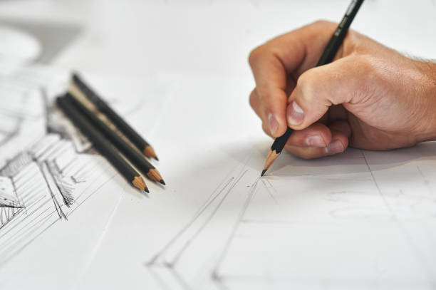 istock Creative architect and interior designer working on hand drawing architectural sketch with black pencil 1276448692