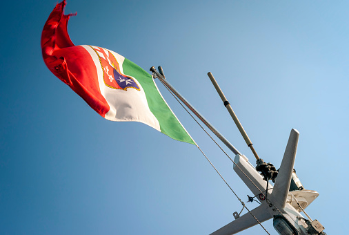 Federal Bureau of Investigation (FBI) flag rostrum with microphone. Digitally generated image