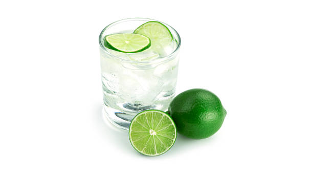 istock Transparent glass with lime lemonade on white background 1276451682