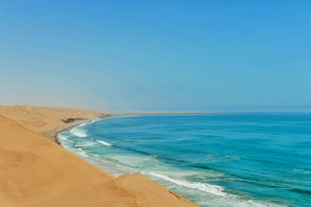 Amazing location with huge sand dunes running into the Atlantic Ocean.