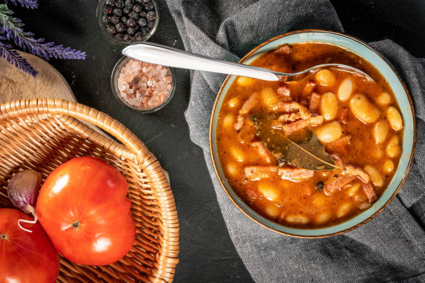 istock Beans with tomato sauce, bacon and sausage. 1276457704