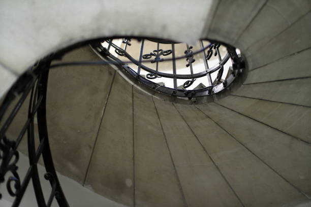 istock Views of a spiral staircase structure 1276459263
