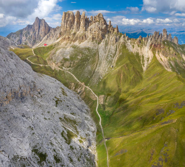 Tierser Alpl Hut, Alpe di Tires Hut, Rosszahn, Dolomites, Italy Aerial panorama of the famous and most beautiful hiking and bike trail leading to the stunning Tierser Alpl Hütte below the Rosszahn Mountain Range within the Schlerngruppe and Rosengarten Nature Parks. Converted from RAW. catinaccio stock pictures, royalty-free photos & images