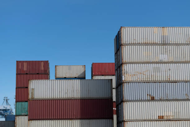 istock stacked container yard in port during day time 1276460979