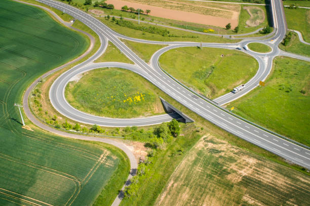 istock Road junction and traffic circle - aerial view 1276463374