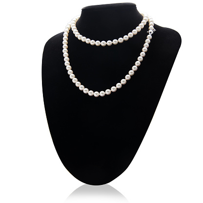 A white pearls necklace mounted in white gold
