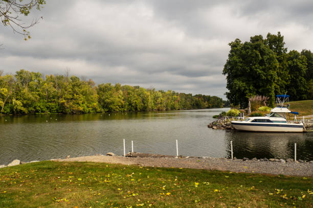 istock Boat at a harbor entrance 1276467656
