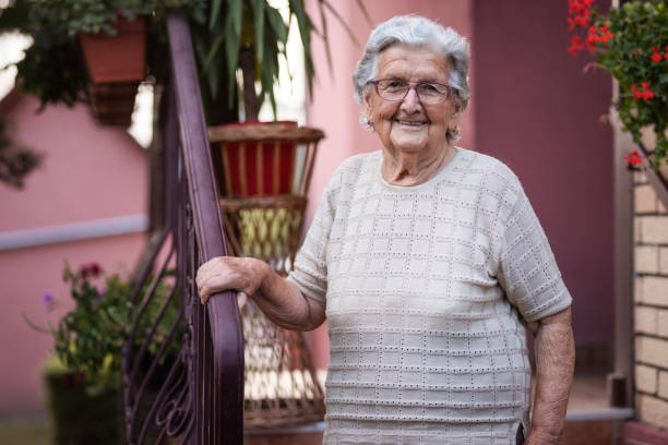 istock Lovely senior woman smiling 1276468537