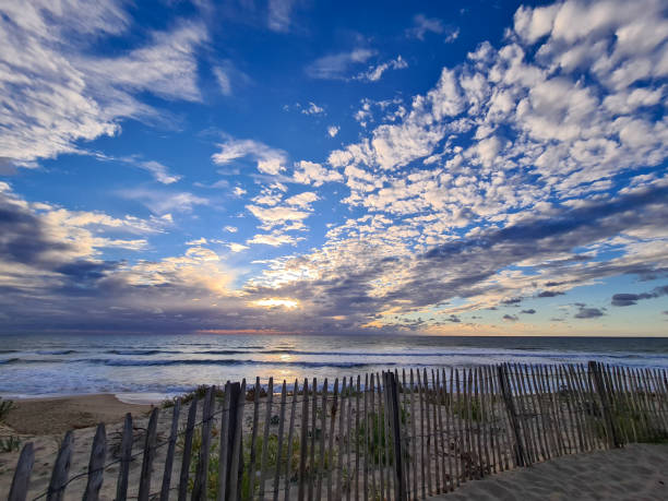 istock Beautiful sandy beach by the ocean 1276471125