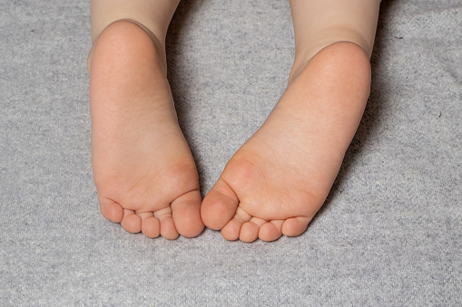 Feet of a three year old child