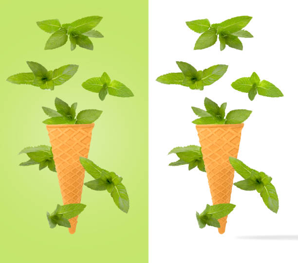 ice cream cones with ingredients falling in motion