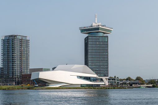 The futuristic multiplex and film museum EYE next to the Amsterdam Tower, which holds offices, restaurants and a entertainment center with swings on the roof terrace.