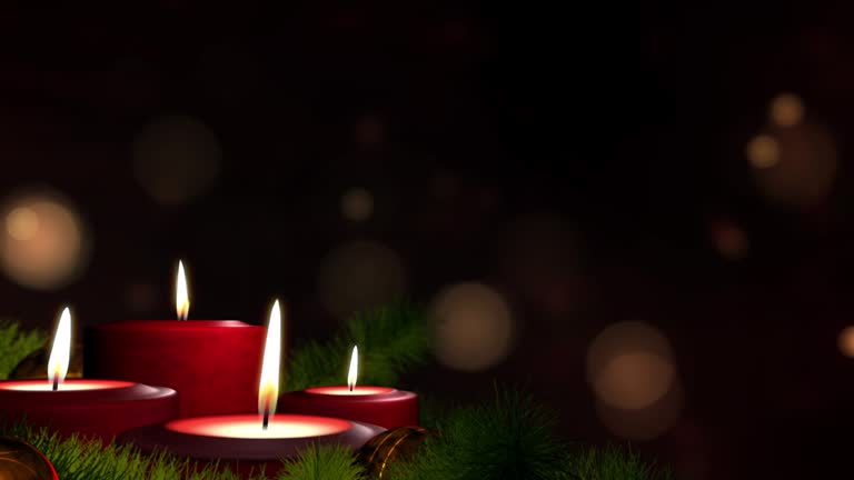 Looped Candles on advent wreath and dark copy space.