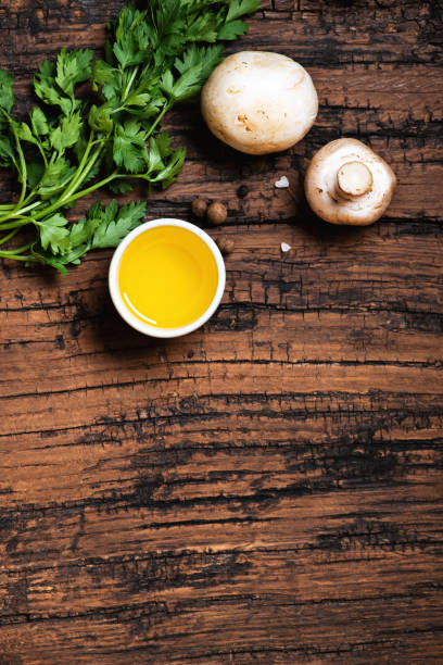 istock Herbs and spices on an old wooden table top view. 1276479817