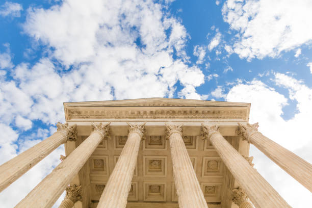 Architectural detail of the Maison Carrée in Nîmes (Occitanie, France) stock photo