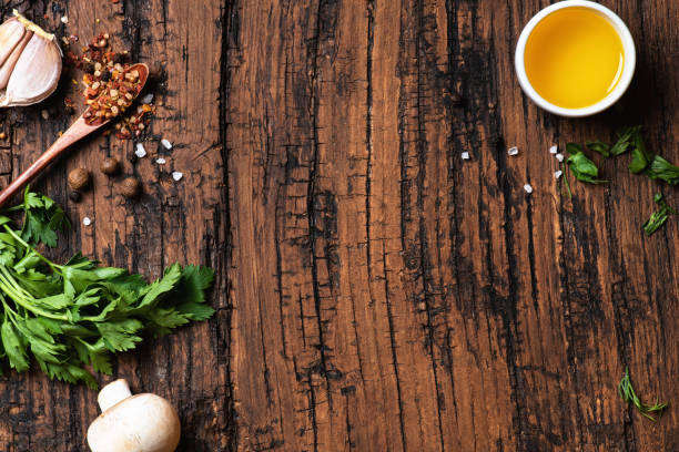 istock Herbs and spices on an old wooden table top view. 1276479931