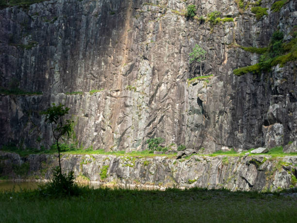 istock Quarry disabled rock wall - rock climbing spot in Brazil 1276481363