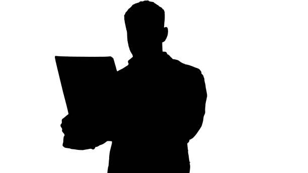 istock Confident doctor working with MRI scan results, Alpha Channel 1276487626