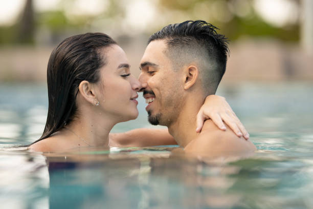 istock Latino couple in the pool 1276487666