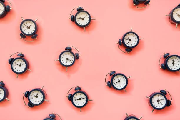 istock alarm clocks on pink 1276487958
