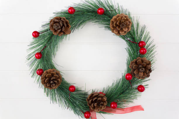 istock Christmas wreath decoration on white background 1276489265