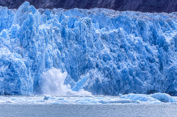 istock Glacier Calving into Alaskan Bay 1276491337