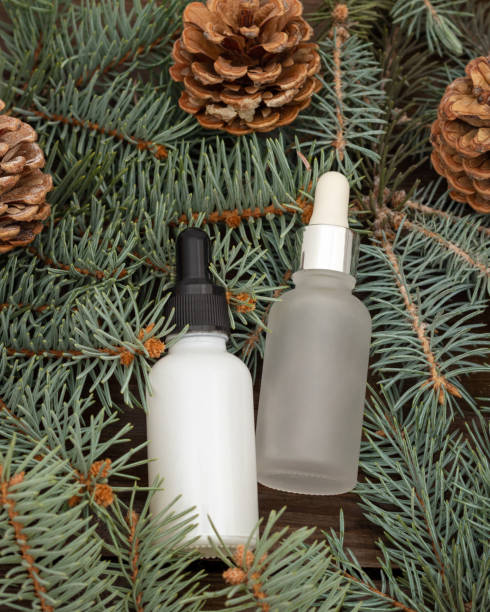 istock Bottles of serum collagen moisturizer, new year composition. 1276493432