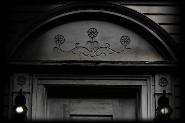 istock a pair of lamps below a charming floral relief carving 1276505000