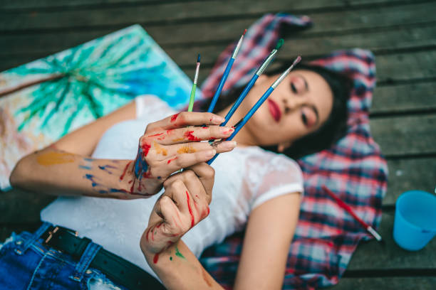 istock Woman artist with her brushes 1276506441