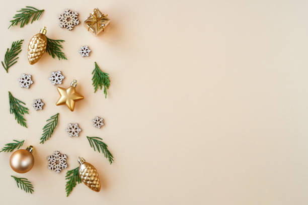 istock Christmas, New year composition. Gift box and holiday decorations on beige background . Flat lay. Top view with copy space 1276506550