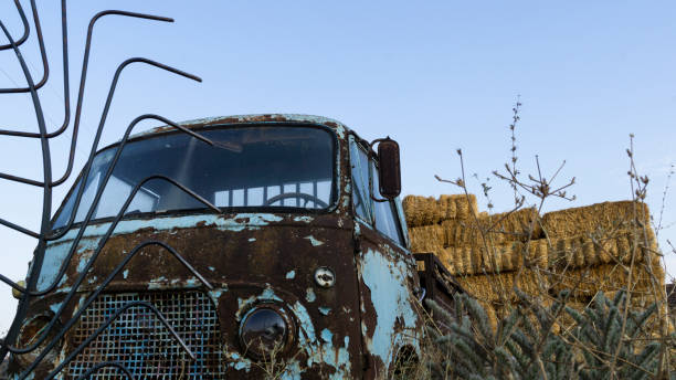 istock hay pile behind an old pickup truck 1276507919