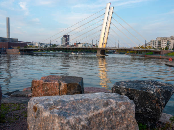 istock A beautiful sunset on the river bank with calm waters on a summer night. 1276508961