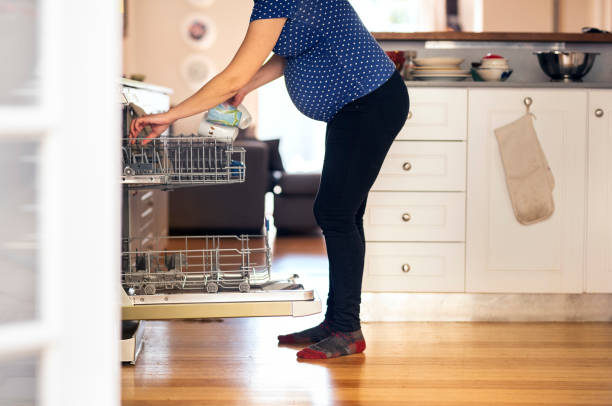 istock Pregnant woman going through her normal daily life 1276509165