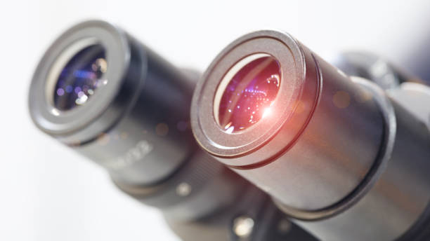 istock Close up of microscope lenses 1276510411