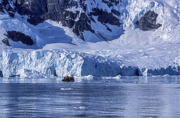 istock Snow Covered Glaciers and Mountains in Antarctica 1276511678