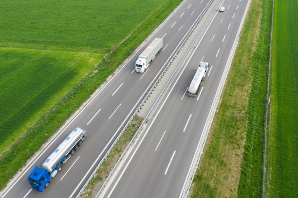 istock Trucks Speeding on Rural Highway 1276511862