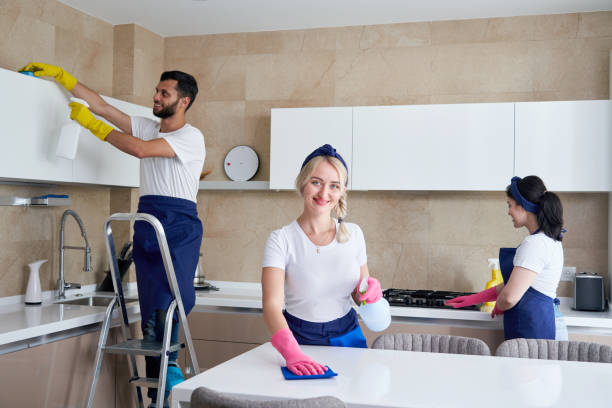 istock Cleaning service team at work in kitchen in private home 1276517130