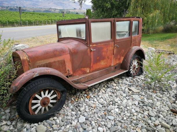 istock Vintage rusty car with the wooden rims 1276519264