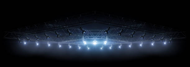 Lighting equipment on a stage. Blue light. Spotlight shines on the stage, scene, podium. Bright lighting with spotlights. Isolated light in black Lighting equipment on a stage. Blue light. Spotlight shines on the stage, scene, podium. Bright lighting with spotlights. Isolated light in black. Background stage performance space stock pictures, royalty-free photos & images