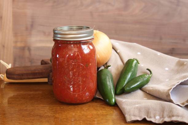 istock home canned salsa in a glass jar 1276520096