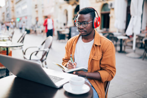 istock Young African American freelance businessman working 1276520210