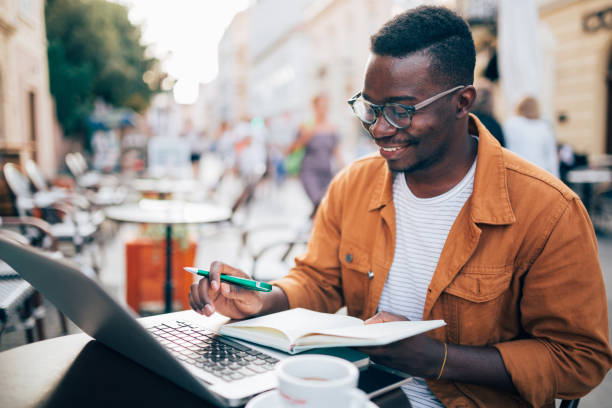 istock Young African American freelance businessman working 1276520213