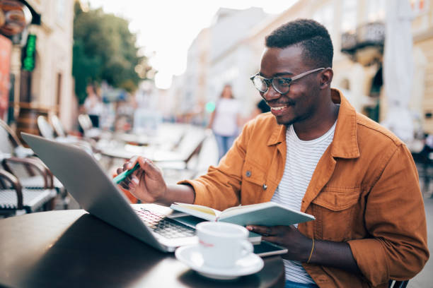 istock Young African American freelance businessman working 1276520233