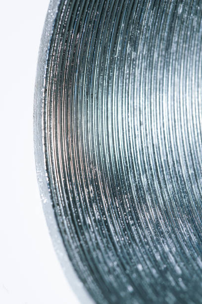 istock steel spring toy coil with black background 1276528148