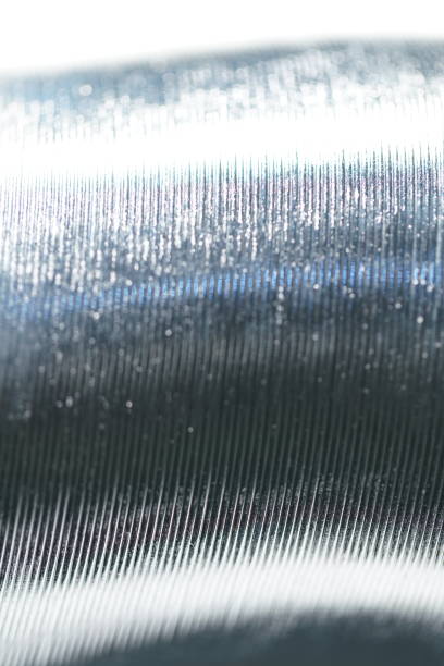 istock steel spring toy coil with black background 1276528198