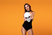 Halloween Girl and skull mask.