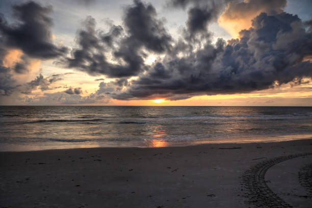 istock Sunset over the White sand at Delnor Wiggins State Park 1276531804